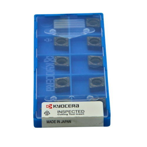 Packaging of Kyocera cutting tool inserts with blue border on a white background