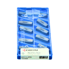 Packaged cutting tools with Kyocera branding on a white background